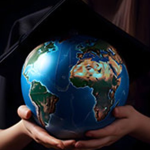 Graduate with globe